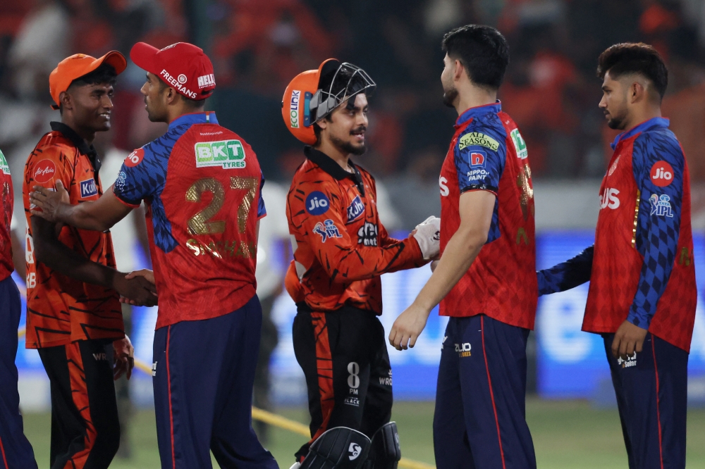  
Punjab Kings and Sunrisers Hyderabad players shake hands after the match  