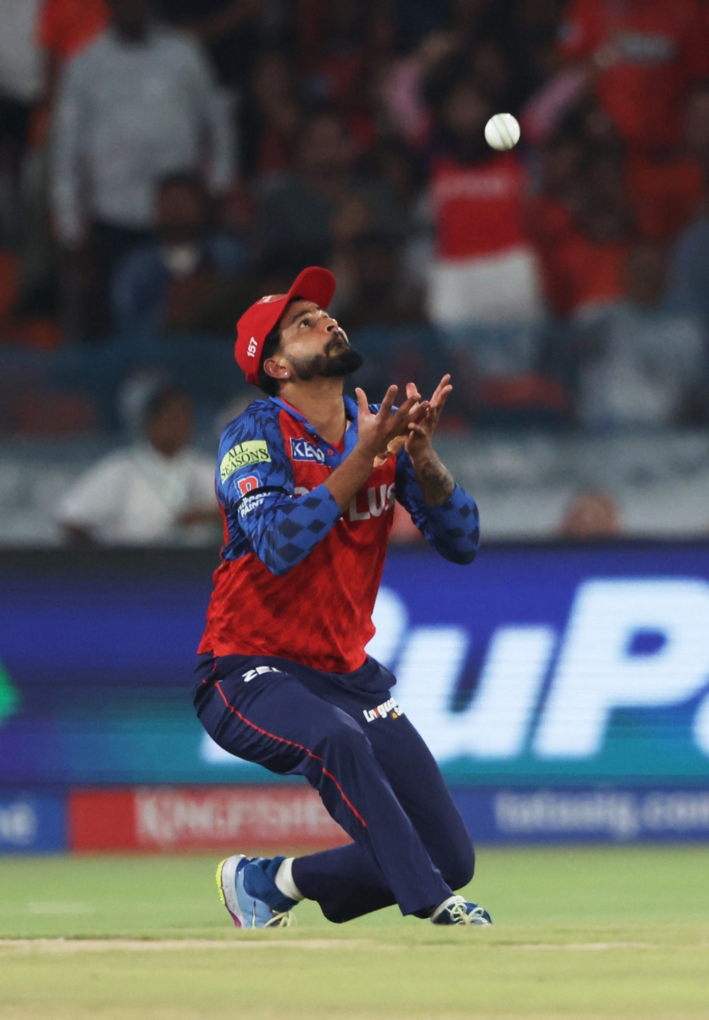  
Punjab Kings' Shreyas Iyer takes the catch to dismiss Sunrisers Hyderabad's Abhishek Sharma, off the bowling of Lockie Ferguson  