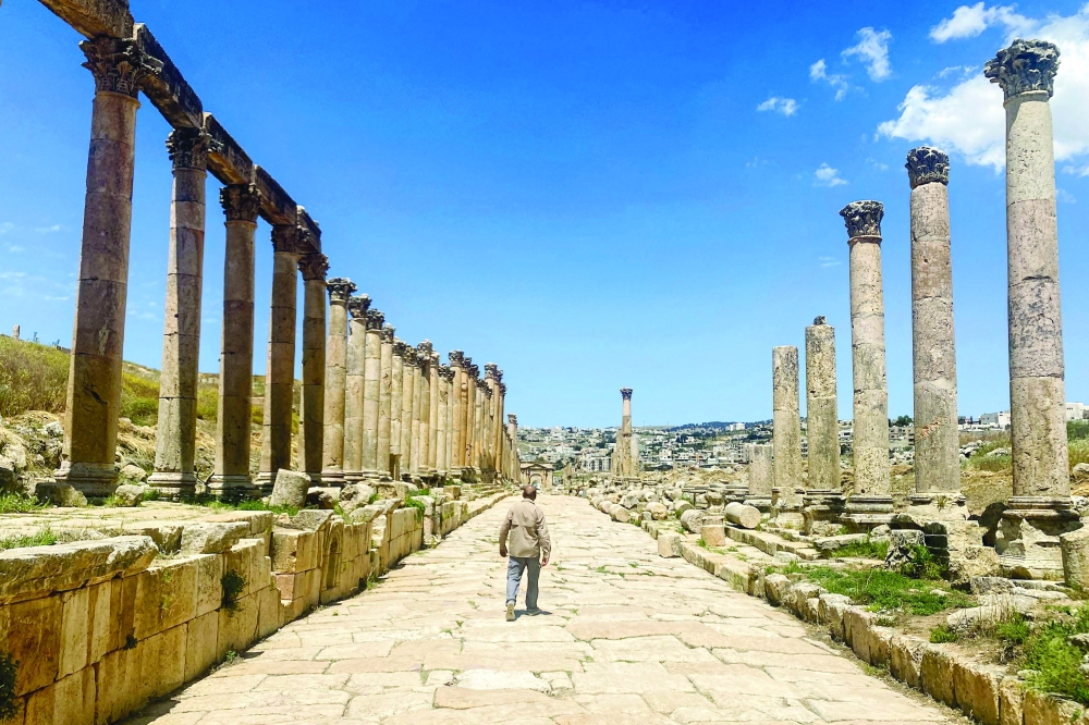 A man walks along the 800-metre-long Cardo colonnade at the ancient Roman ruins of Jerash in northern Jordan. - AFP
