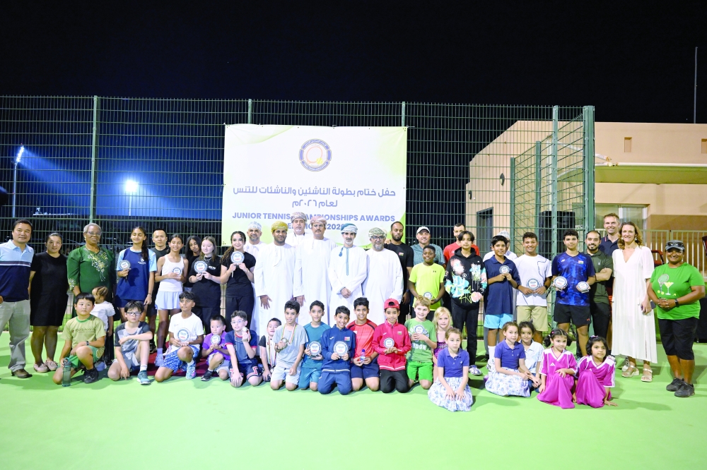 The winners of the Junior Tennis Tournament with the officials and supporters.