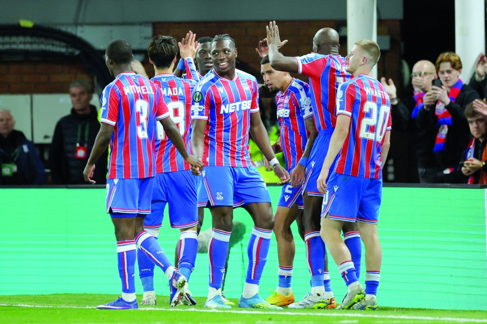 Crystal Palace's Jaydee Canvot celebrates with teammates after Ismaila Sarr scores their second goal. — Reuters