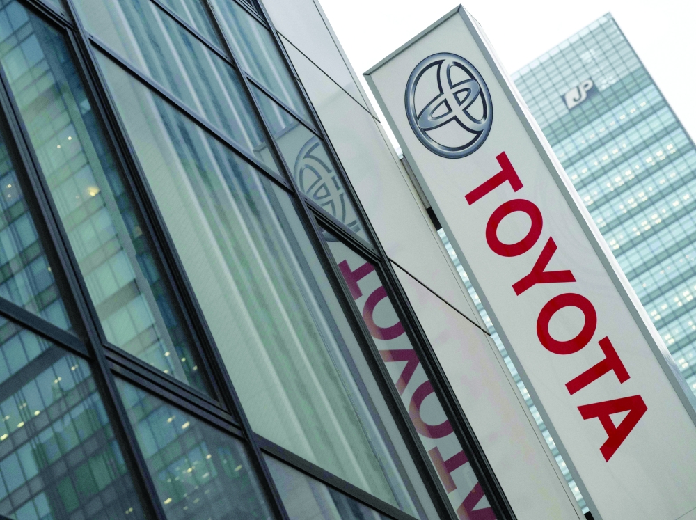 A Toyota logo is seen on the side of a store in Tokyo