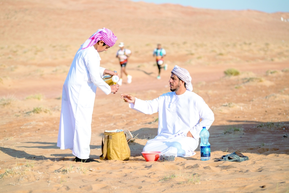 Serving Kahwa in the desert as part of Oman Desert Marathon