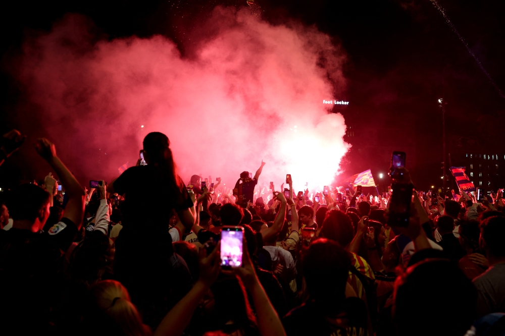  
FC Barcelona fans celebrate winning LaLiga  