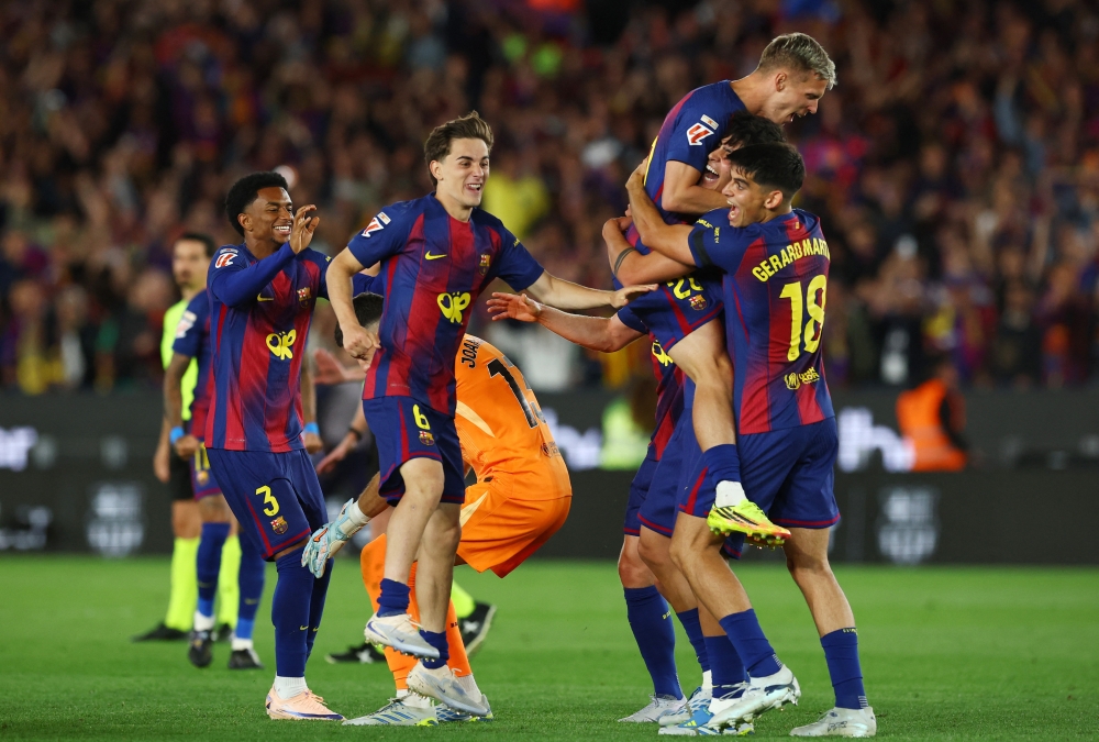  
FC Barcelona players celebrate after winning the LaLiga 