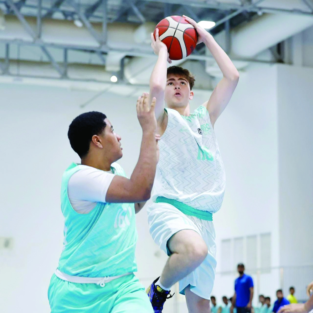 Action from the latest round of the Athletes Preparation Centres Basketball League. — Amar al Musafir