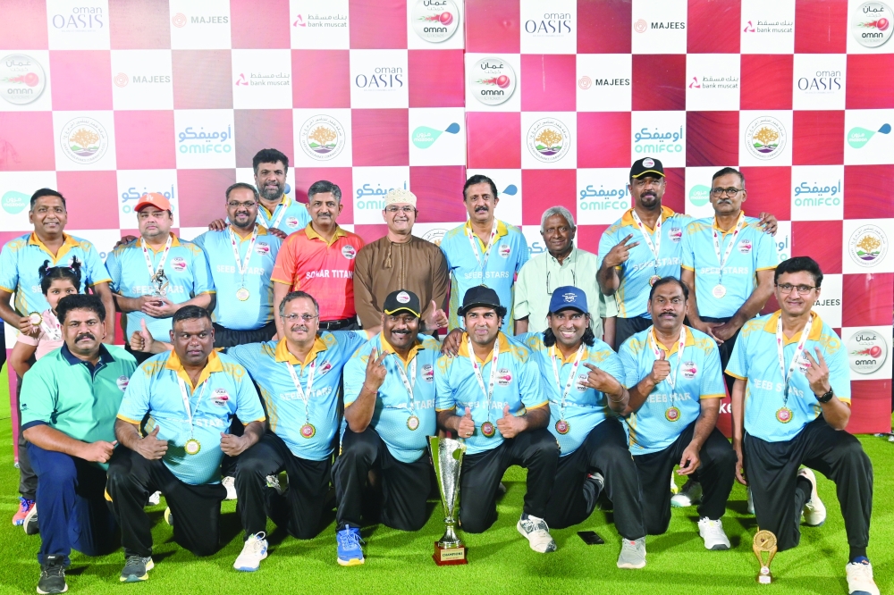 Champions Seeb Stars pose with their trophy.