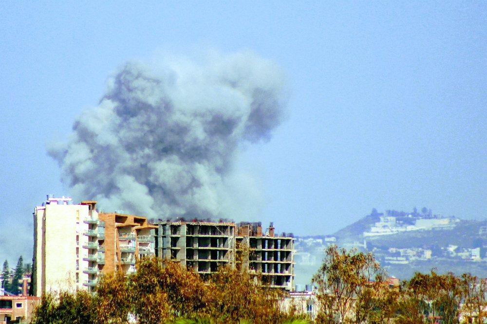 Smoke rises following Israeli bombardment on the village of Bazourieh as seen from nearby Tyre in southern Lebanon. — AFP