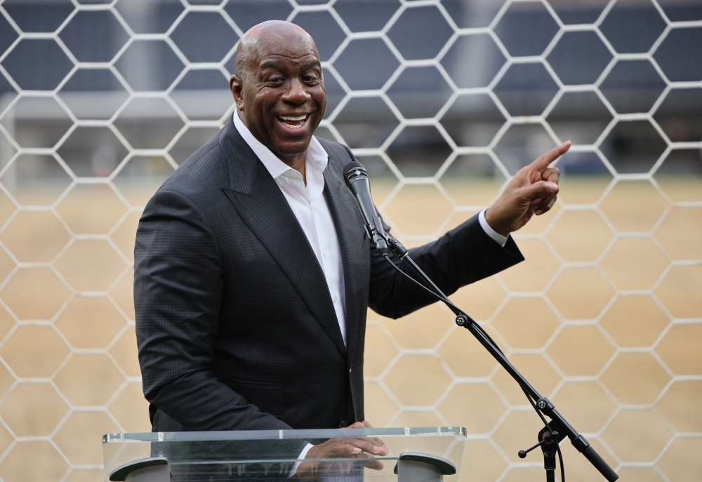  
Former basketball player Earvin 'Magic' Johnson speaks during an event marking 30 days until the start of the World Cup 