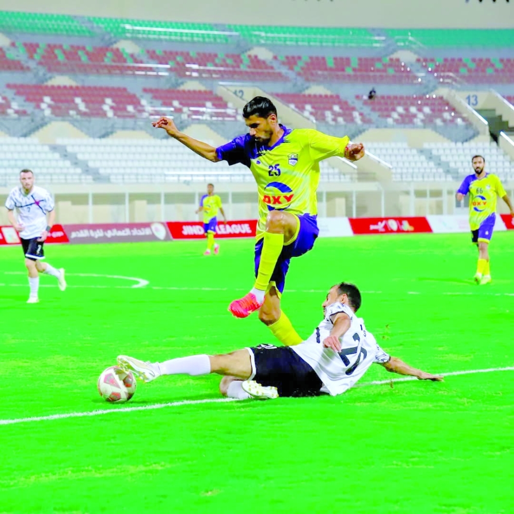 Players challenge for the ball during Al Rustaq’s victory over Ibri.