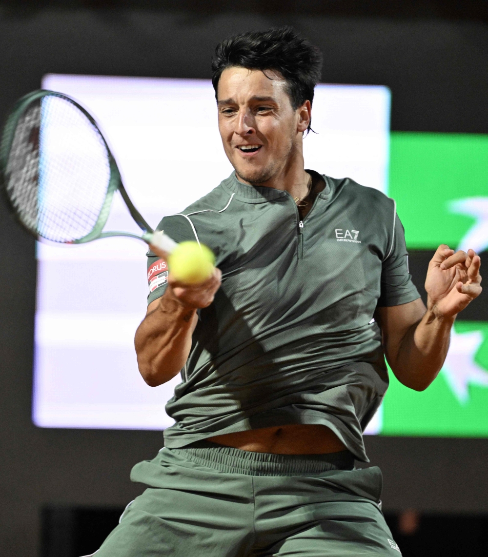 Italy's Luciano Darderi hits a return to Spain's Rafael Jodar during the ATP Rome Open tennis tournament  