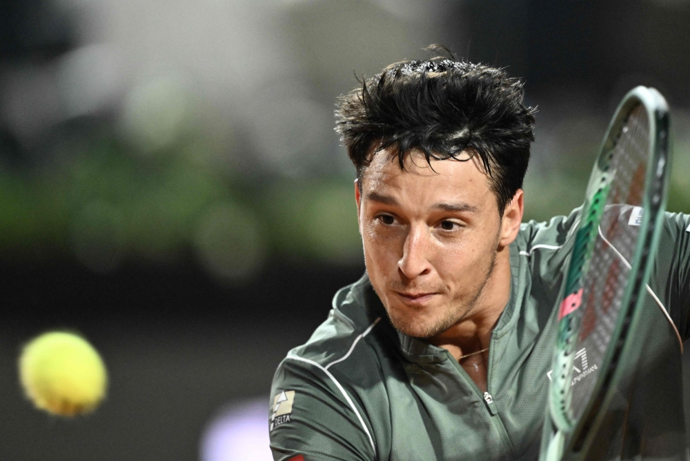 Italy's Luciano Darderi hits a return to Spain's Rafael Jodar during the ATP Rome Open tennis tournament  