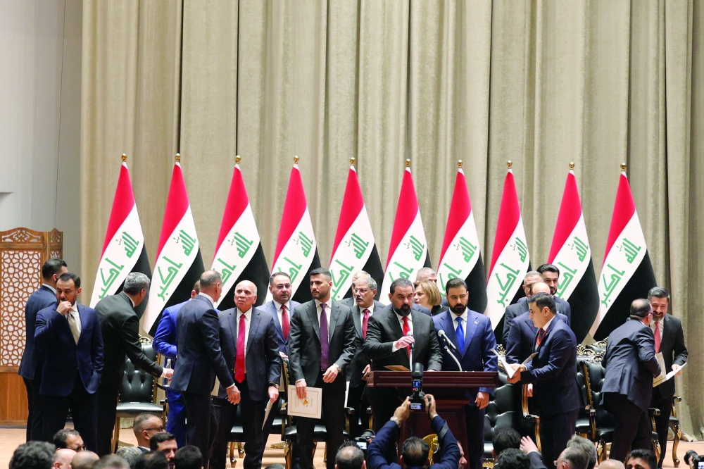 Iraqi lawmakers attend a parliamentary session to vote in a new government headed by Ali al Zaidi as prime minister, in Baghdad. — Reuters