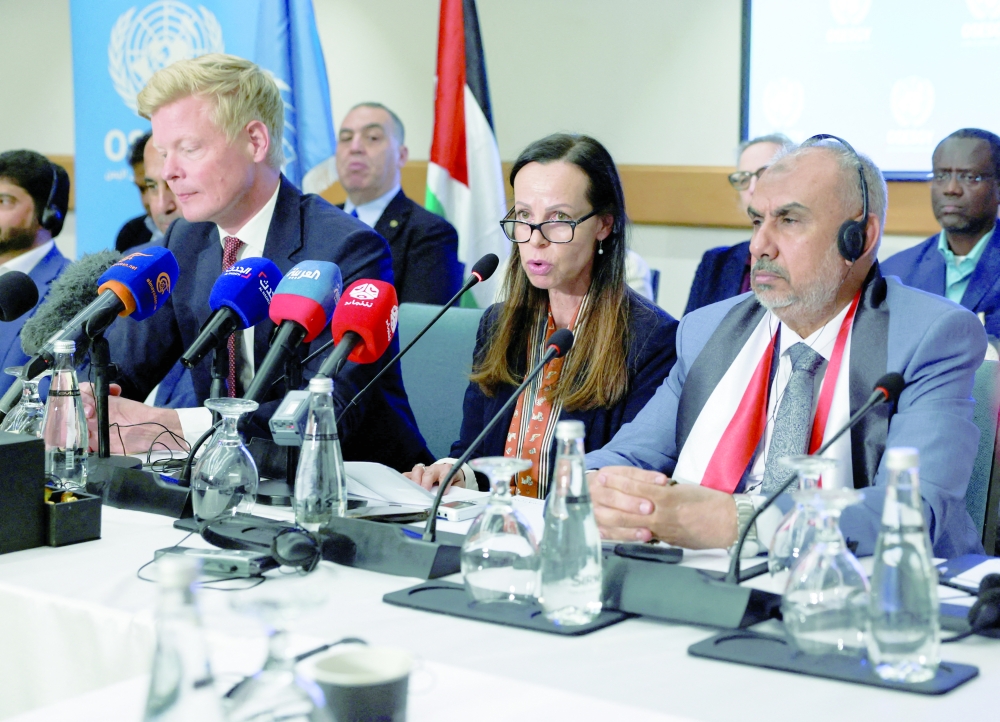 Christine Cipolla from the International Committee of the Red Cross (ICRC) sits next to Hans Grundberg, UN Special Envoy for Yemen, as members of the Supervisory Committee on the Detainees Release Agreement attend the closing ceremony of a meeting between the Yemeni government and the Ansar Allah in Amman. — Reuters