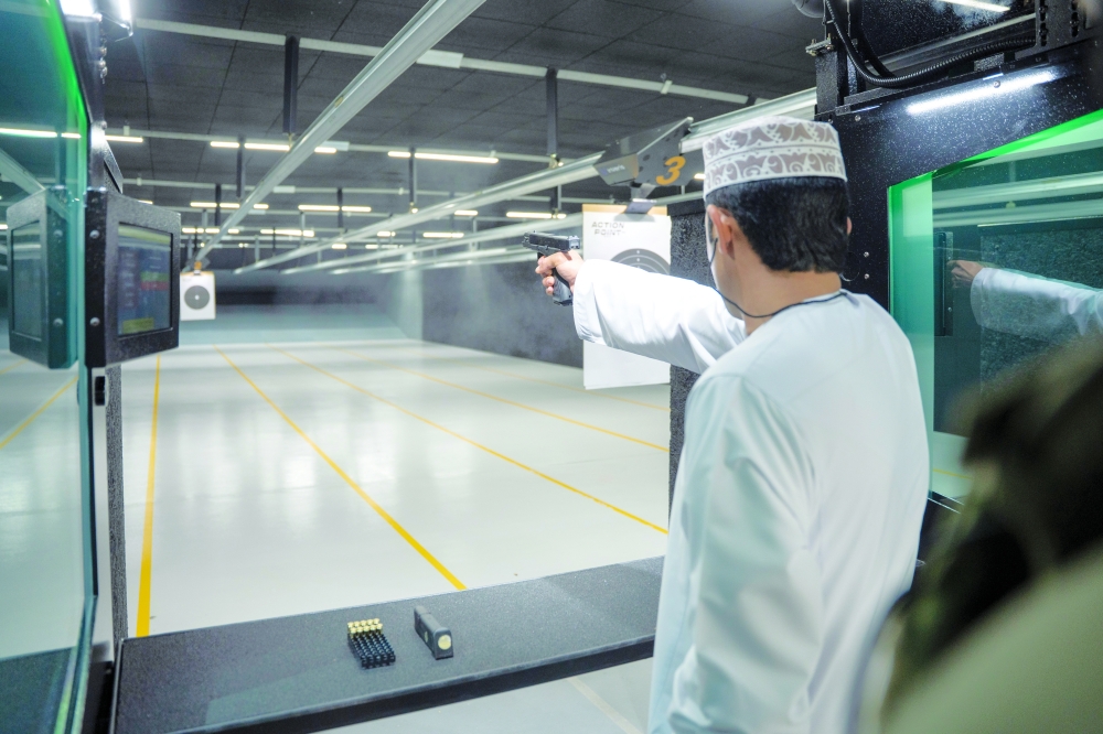 A shooter focuses on the target during the Action Point-organised Oman Shooting Club Shield Championship.