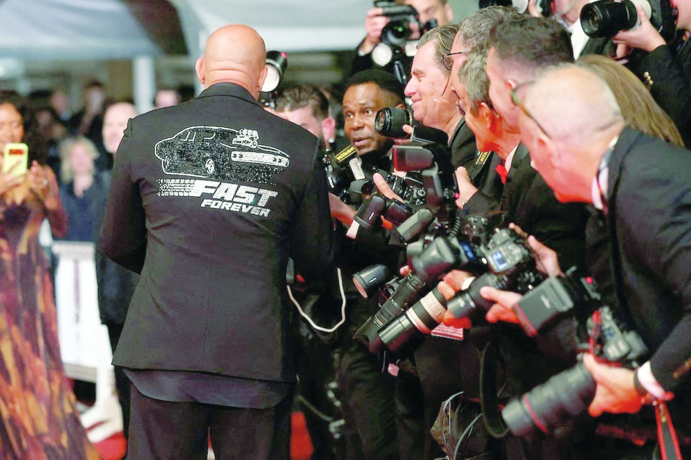 Vin Diesel speaks to photographers on the red carpet for the screening of the film "The Fast and the Furious" presented as part of Special Screenings to celebrate the 25th anniversary. — Reuters