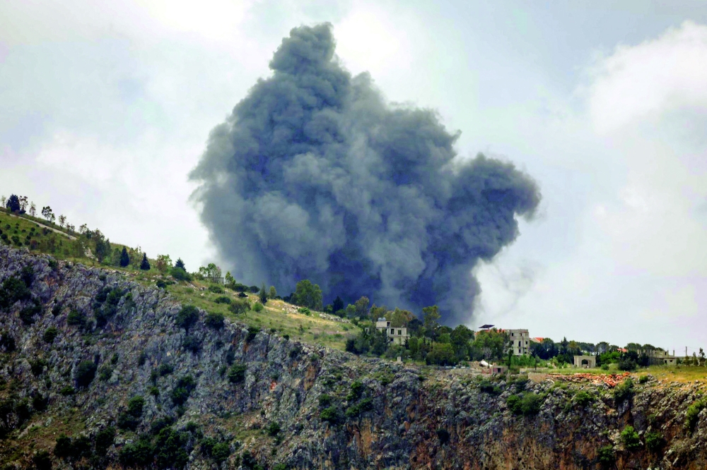 Smoke rises following Israeli bombardment on the village of Arnoun in southern Lebanon. — AFP