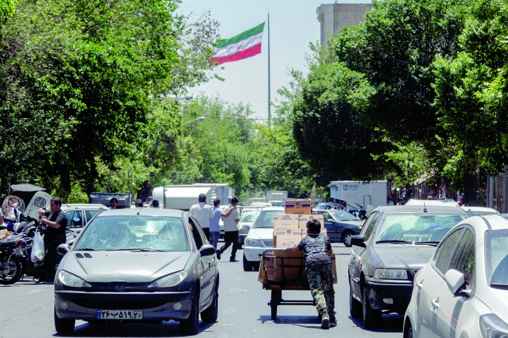 Traffic near a wholesale bazaar in Tehran. — NYT file photo 