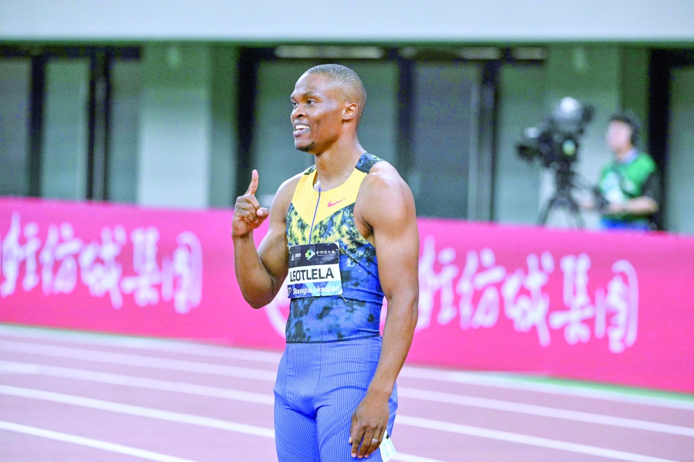 South Africa's Gift Leotlela celebrates winning the men's 100m event during the Shanghai/Keqiao Diamond League athletics meeting in Keqiao, Shaoxing in China's eastern Zhejiang province on May 16, 2026. (Photo by HECTOR RETAMAL / AFP)
