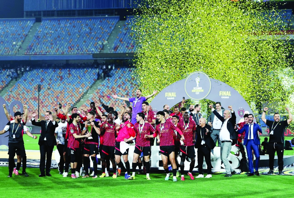 USM Alger players celebrate winning the CAF Confederation Cup.