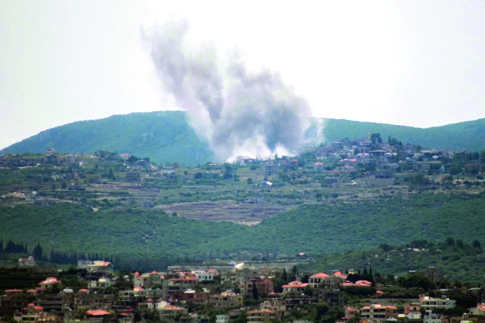 Smoke rises following Israeli bombardment on the village of Zibqin as seen from nearby Tyre in southern Lebanon. - AFP 