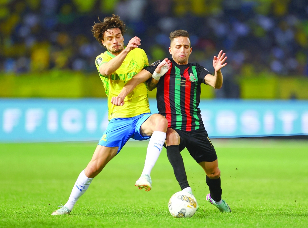 Mamelodi Sundowns' Nuno Santos in action with AS FAR's Ahmed Hammoudan. — Reuters