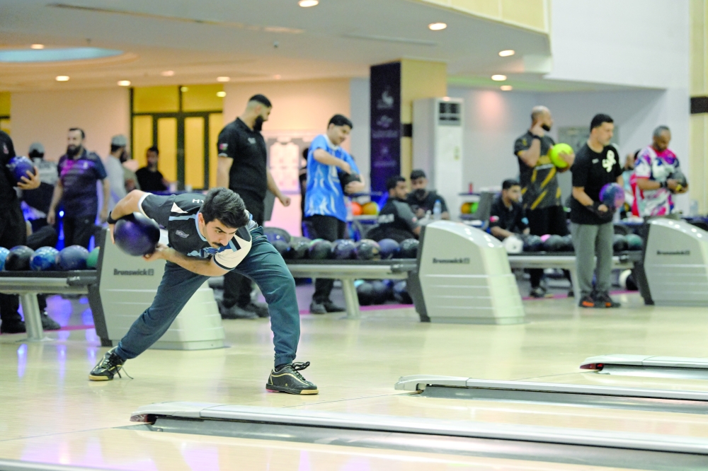 Participants compete during the Oman Bowling Committee’s May Bowling Championship at Seeb Bowling Centre. — Abdulwahid al Hamadani