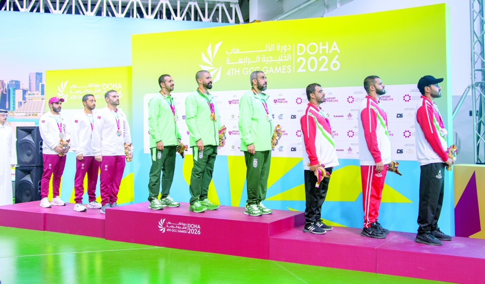 The shooting team on the podium after claiming third place.