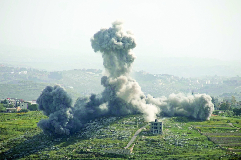 Smoke rises from the site of an Israeli air strike that targeted the southern Lebanese village of Deir El Zahrani. — AFP File