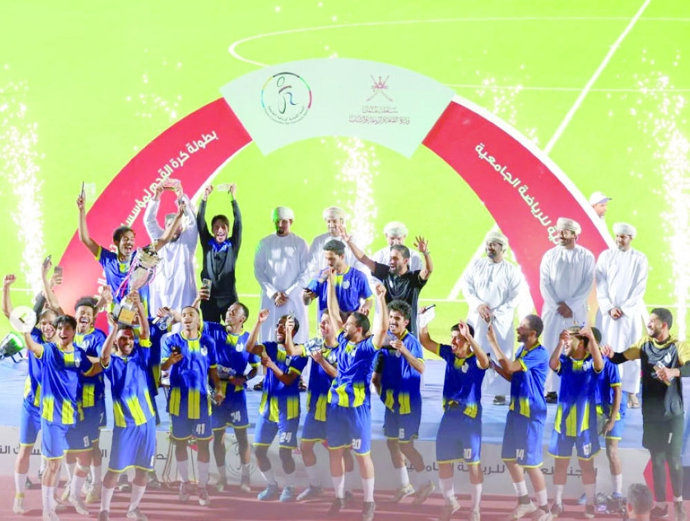 Champions University of Technology and Applied Sciences celebrate with the trophy.