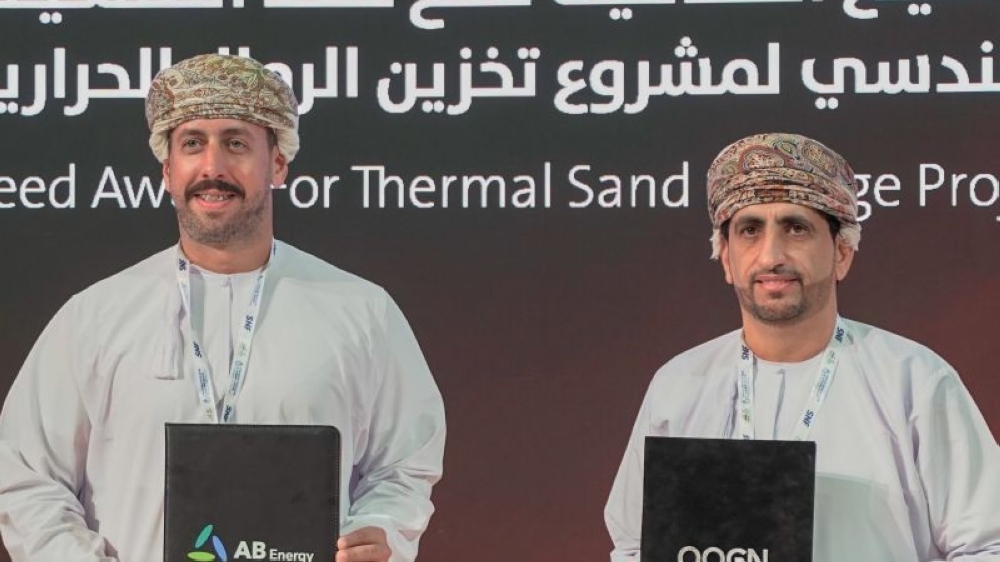 Representatives of OQGN and AB Energy at the signing last week.
