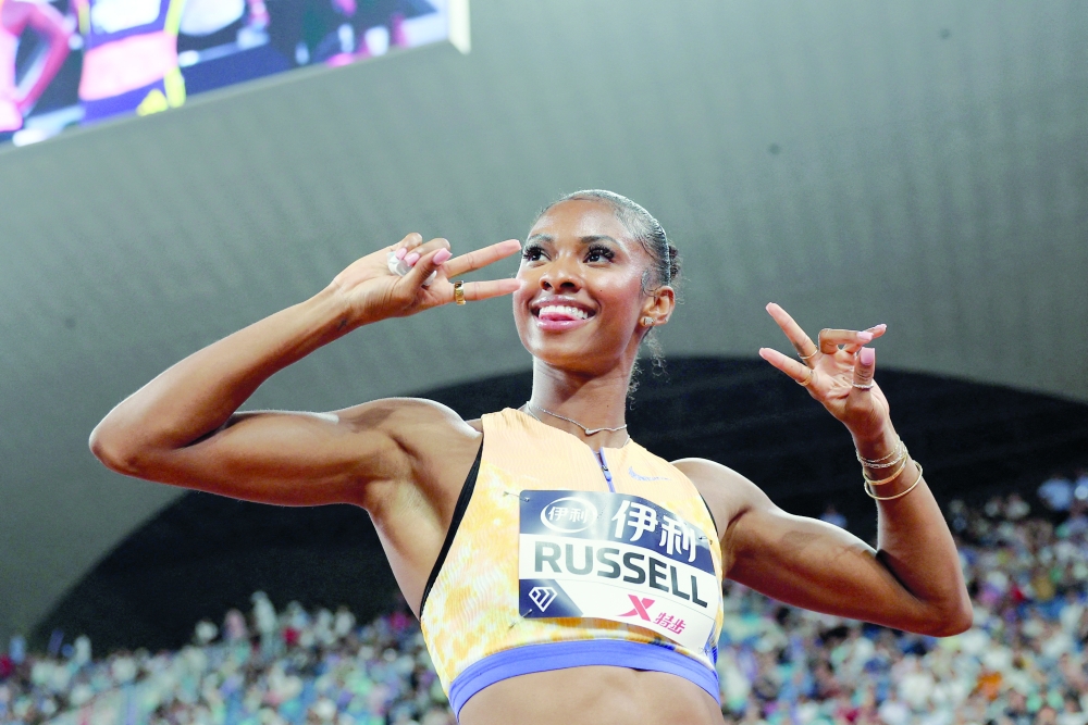 Athletics - Diamond League - Xiamen - Xiamen Egret Stadium, Xiamen, China - May 23, 2026
Masai Russell of the U.S. celebrates after winning the women's 100m hurdles REUTERS/Go Nakamura