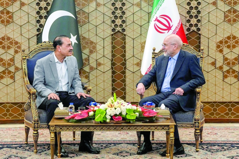 Iranian Parliament Speaker Mohammad Bagher Ghalibaf meets with chief of Defence Forces of Pakistan, Field Marshal Asim Munir, in Tehran. — Reuters