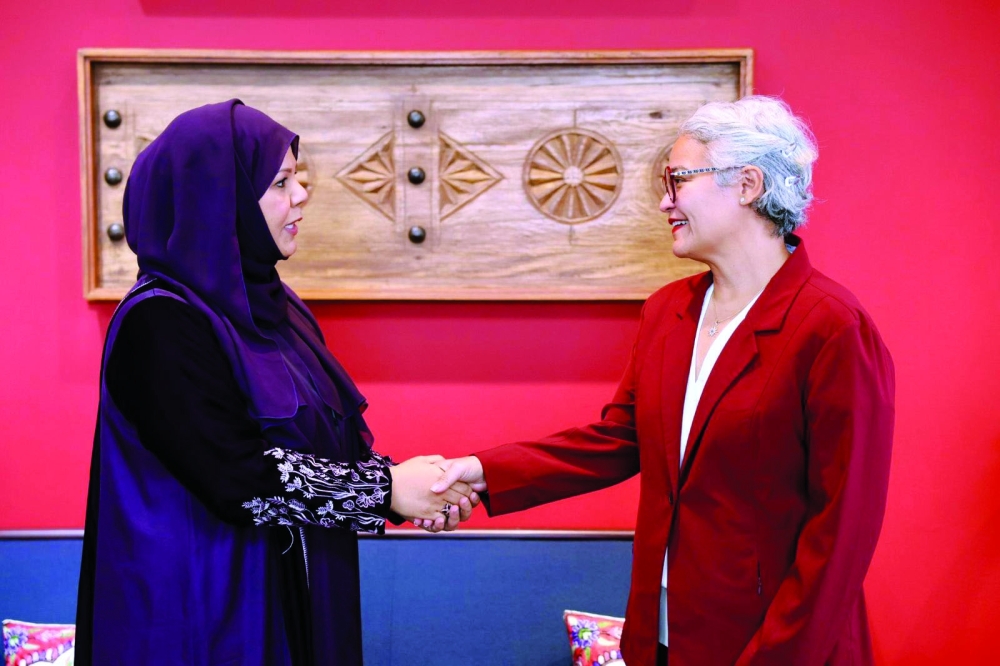 Dr Amira al Raidan with US Ambassador Ana Escrogima.