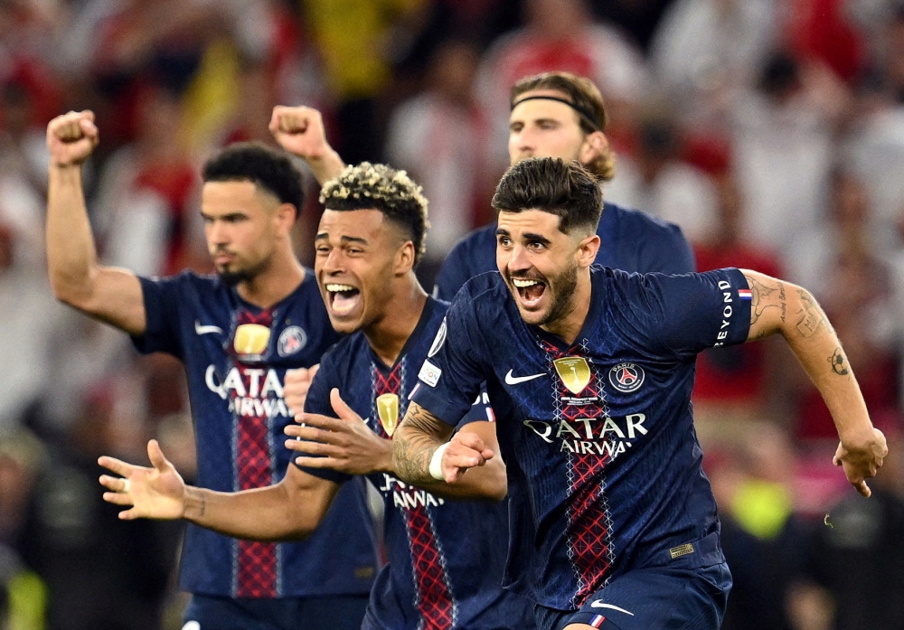  
Paris St Germain's Lucas Beraldo, Desire Doue, Warren Zaire-Emery and Illia Zabarnyi celebrate after winning the UEFA Champions League  