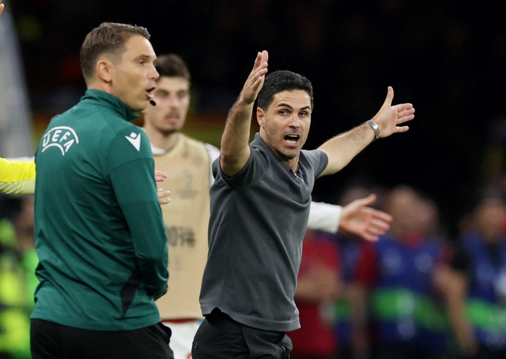  
Arsenal manager Mikel Arteta reacts  