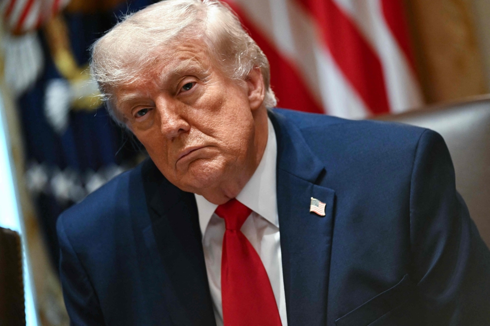 US President Donald Trump looks on during a cabinet meeting in the Cabinet Room of the White House in Washington, DC, on May 27, 2026.