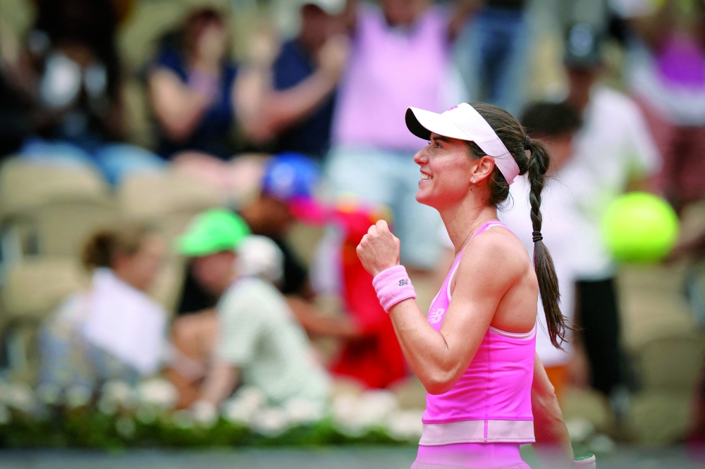 Romania's Sorana Cirstea celebrates her victory at the end of her women's singles match against China's Wang Xiyu. — AFP
