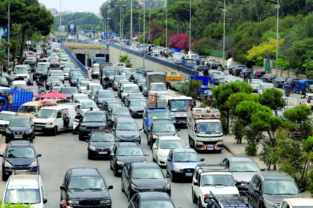Traffic on a road as people make their way while fleeing the southern suburbs of Beirut. — Reuters 