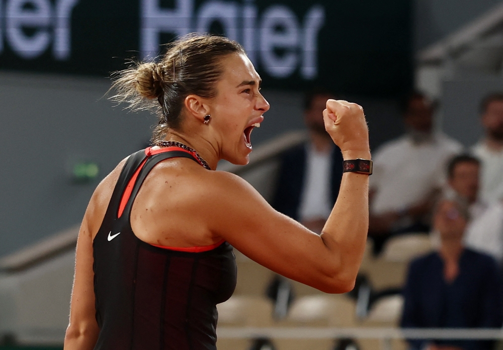  
Belarus' Aryna Sabalenka celebrates winning her fourth round match against Japan's Naomi Osaka  