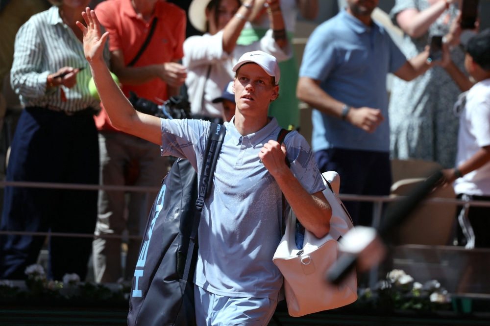Italy's Jannik Sinner acknowledges the crowd 