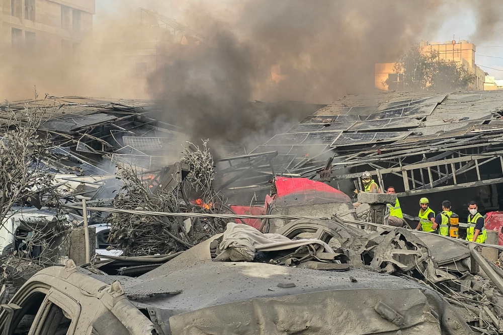 First responders gather at the site of an Israeli strike that hit near a hospital in the southern Lebanese city of Tyre on June 1, 2026.