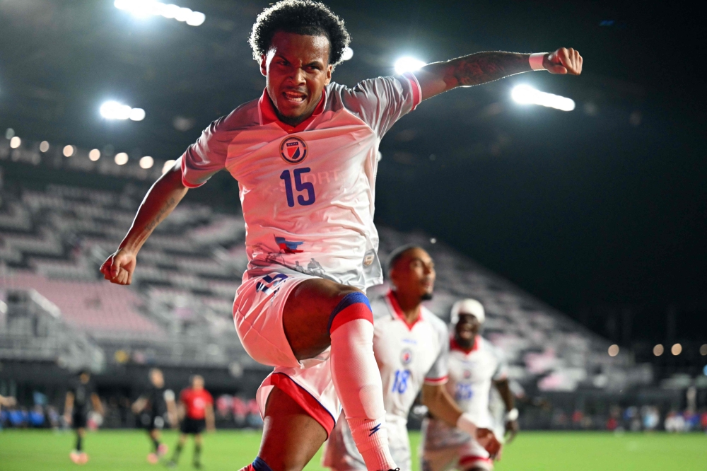 Haiti's forward #15 Ruben Providence celebrates after scoring a goal 
