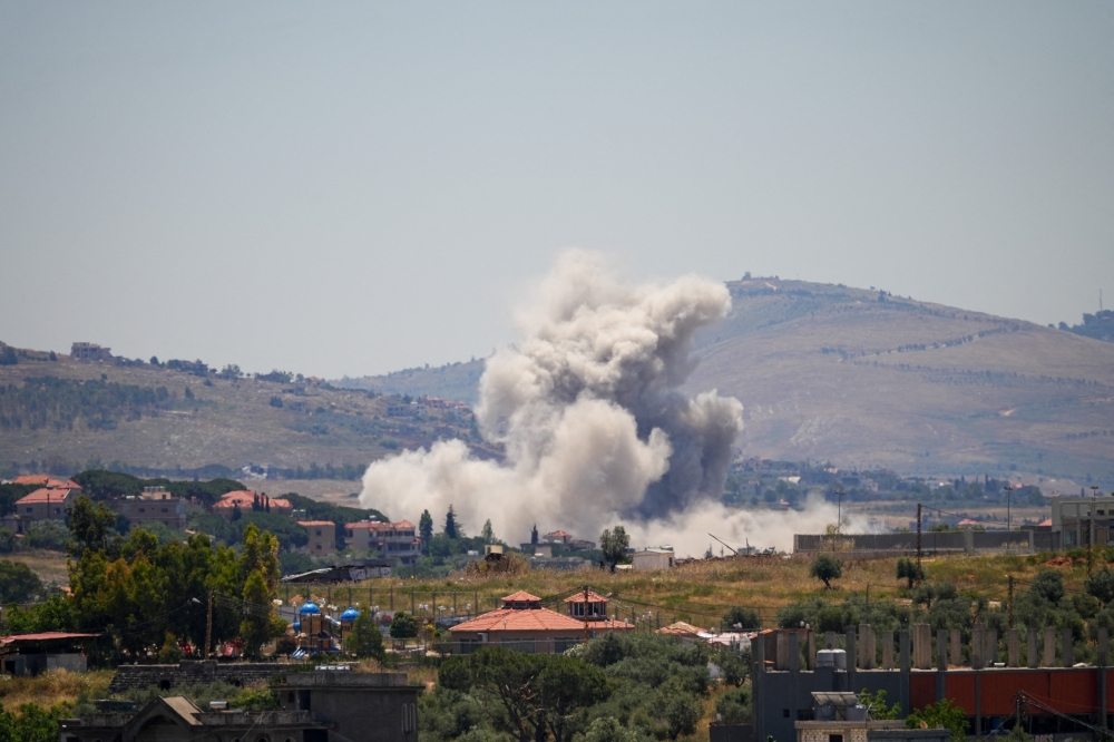 Smoke billows from southern Lebanon, following Israeli strikes, as seen from Nabatieh, Lebanon, June 4, 2026.