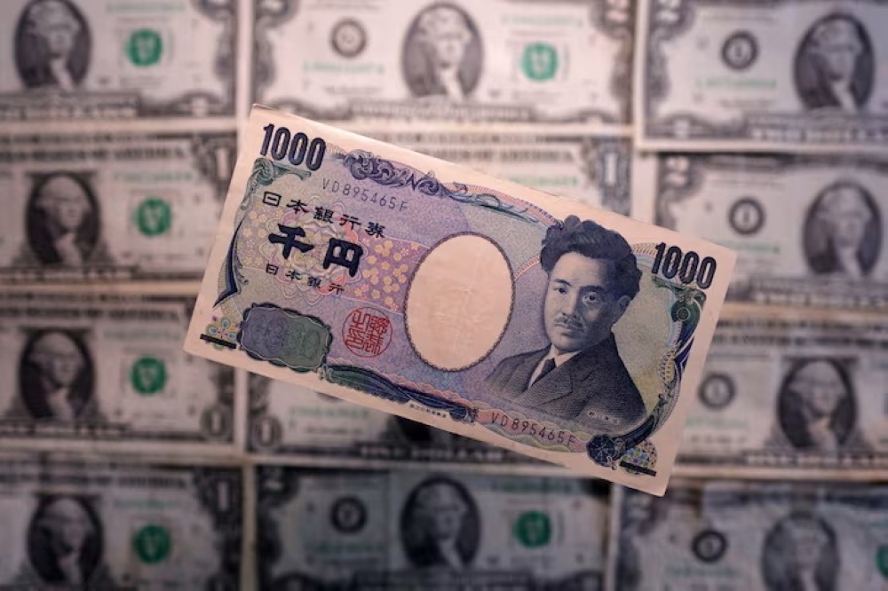 Dollar at two month high as Gulf hostilities flare, yen wobbles near intervention zone