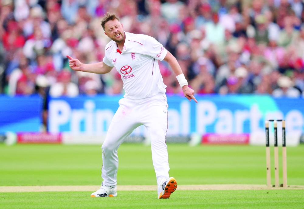 England's Ollie Robinson celebrates after taking the wicket of New Zealand's Matt Henry Lord's Cricket Ground