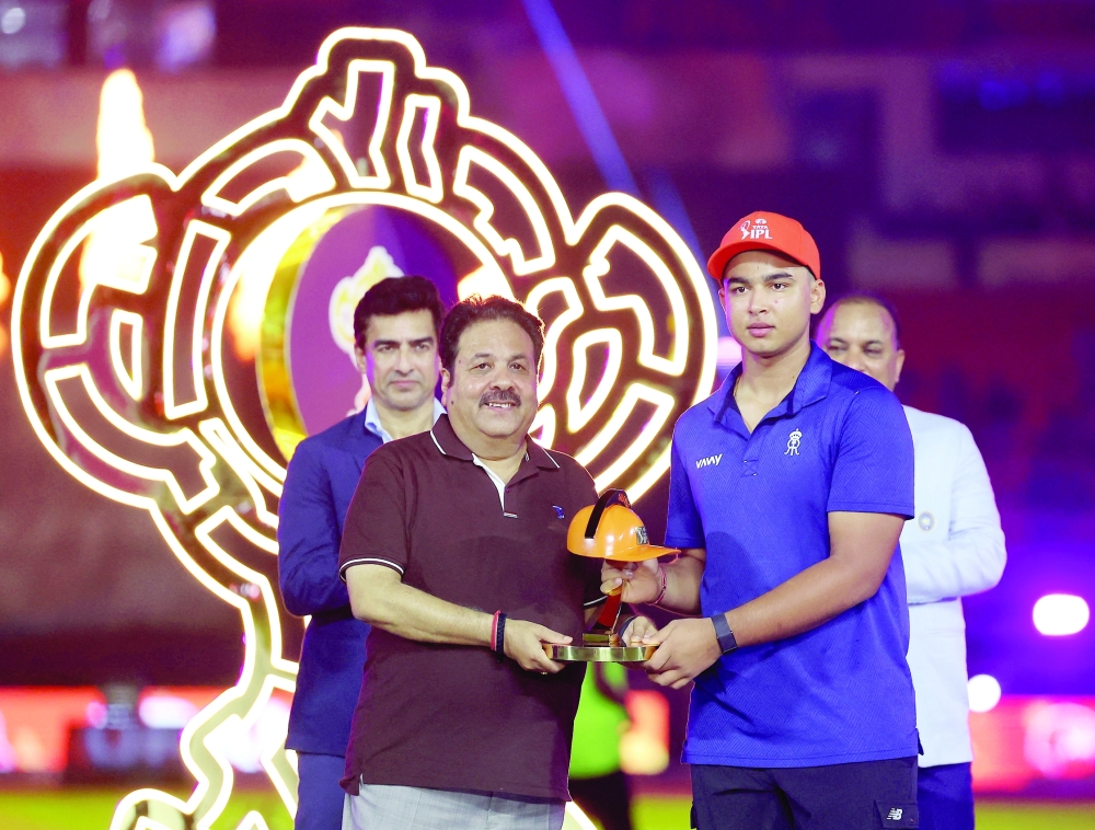 Rajasthan Royals' Vaibhav Sooryavanshi is awarded the Orange Cap for being the highest run-getter by BCCI Vice-President Rajeev Shukla