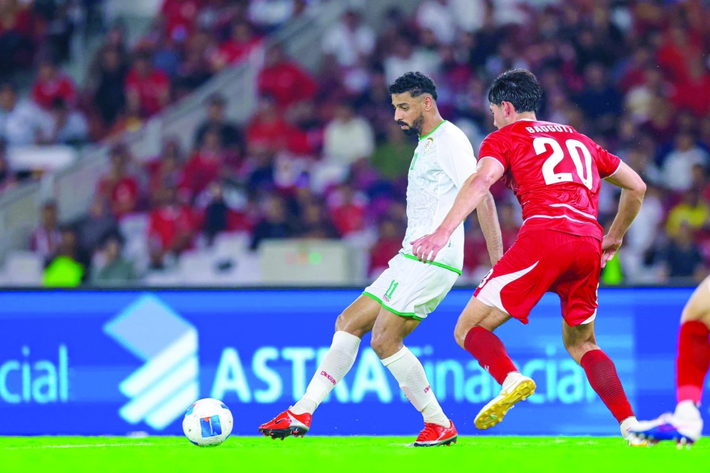 Oman's Mohsin al Ghassani in action against Indonesia.