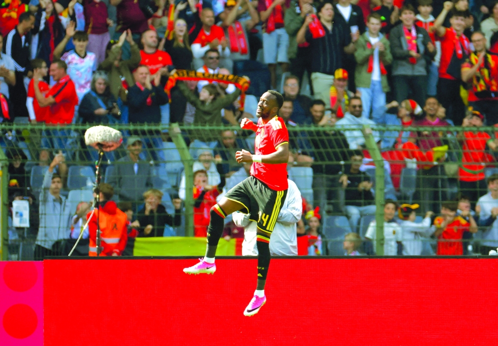 Belgium's Dodi Lukebakio celebrates scoring their fourth goal