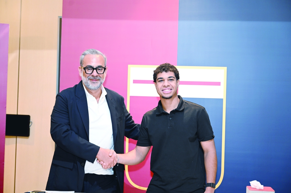 Suhaib al Kharousi after signing his three-year Genoa contract. — Abdulwahid al Hamadani 